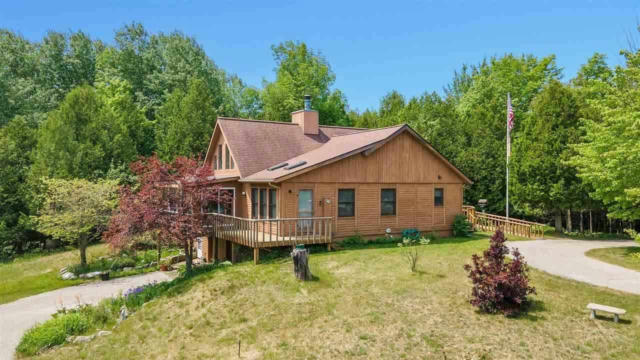 17870 OLD ORCHARD TRL, CHARLEVOIX, MI 49720, photo 4 of 37